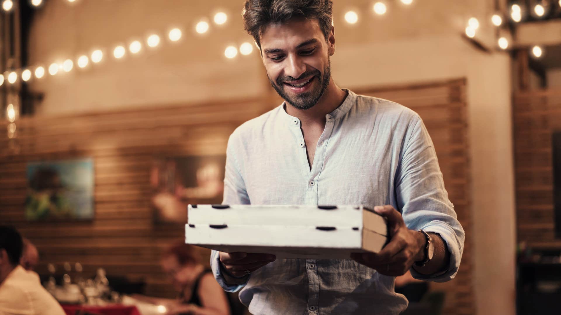 man who dreads a quiet sunday picking up dinner from the local pizza place