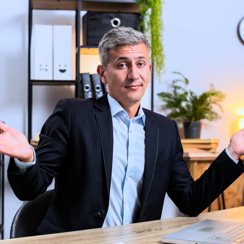 man with low intelligence shrugging off things he doesn't understand at work