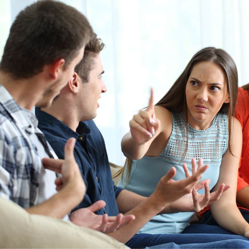 exhausting woman arguing with friends in a group