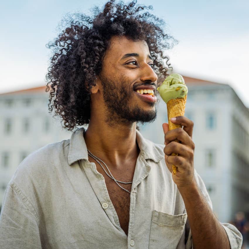 man eating ice cream as a prize because he grew up having to finish everything on his plate