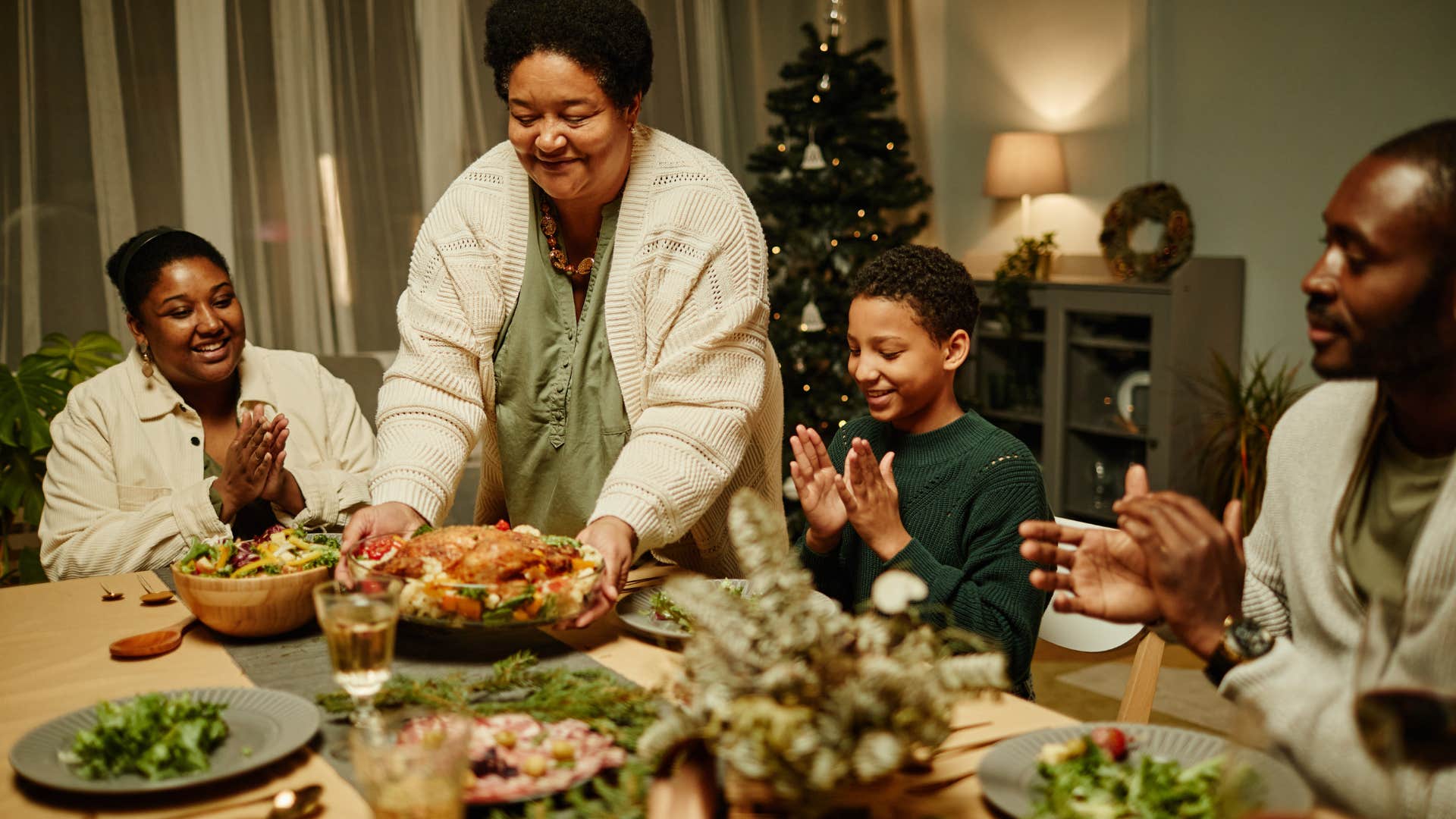 boomer grandma serving her family big portions