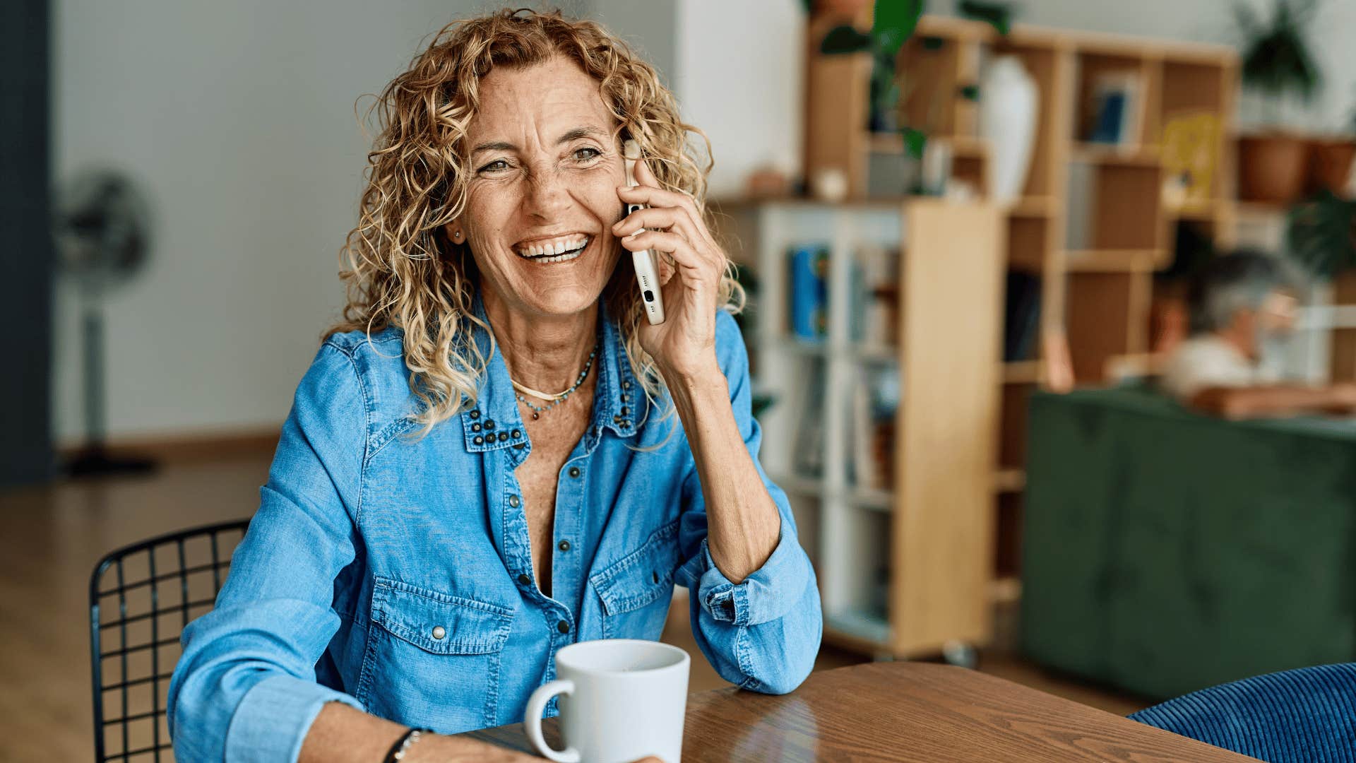 gen x woman keeping conversations going with others on the phone