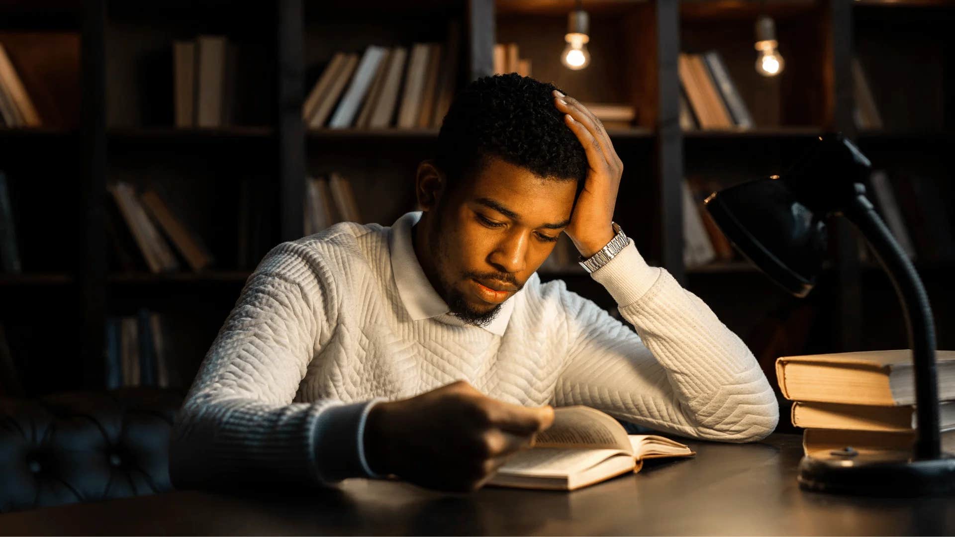 student sitting in library