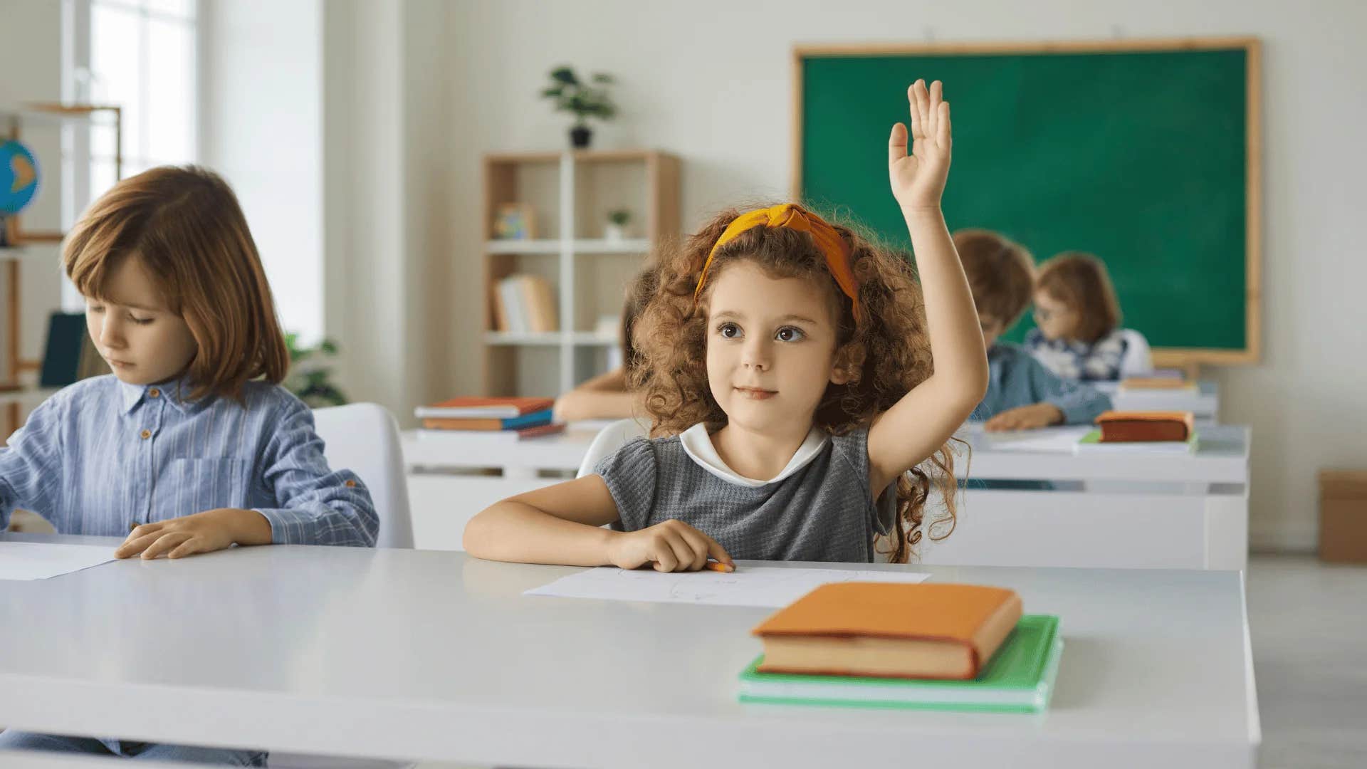 student responding to paper attendance roll call