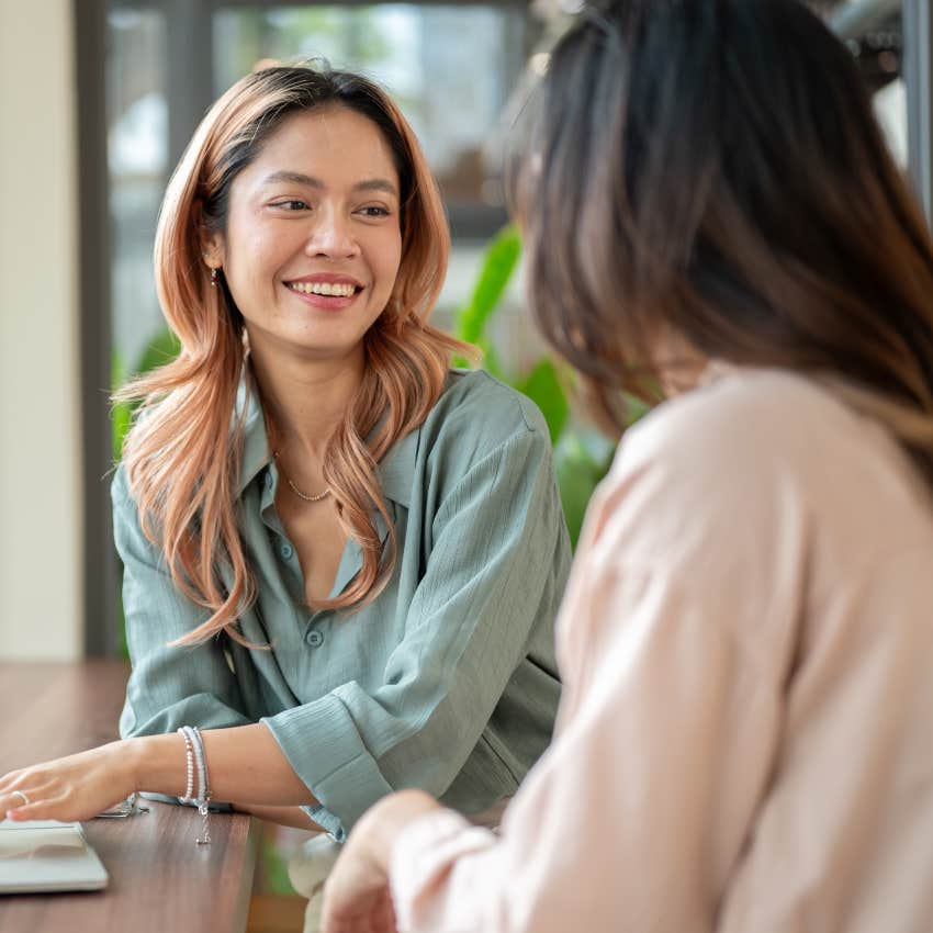 Gen Z woman having a workplace conversation