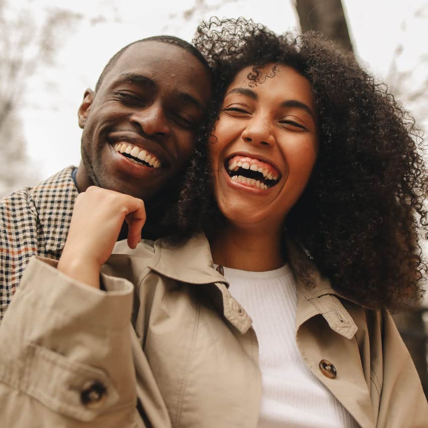 happy millennial couple being emotionally intimate