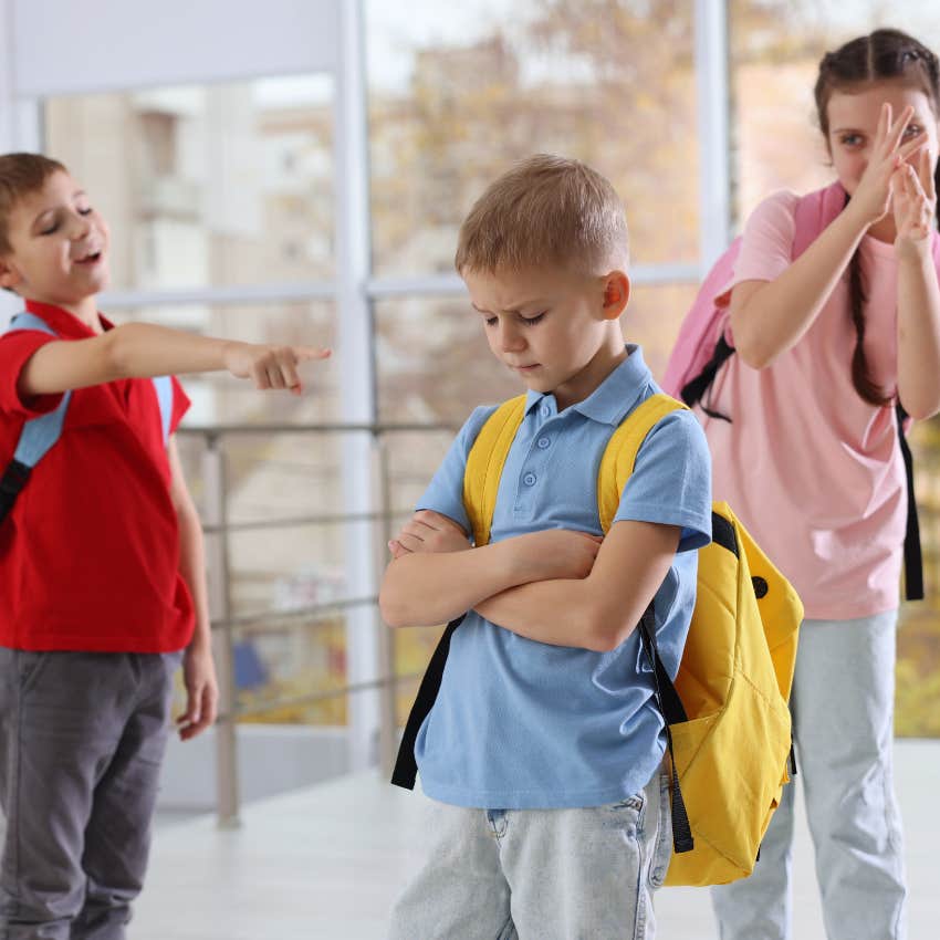 bullies intimidating a boy