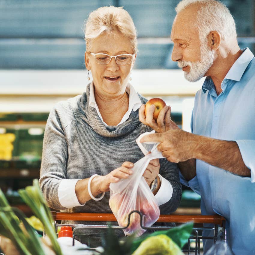 boomer couple wearing nice clothes at the grocery store