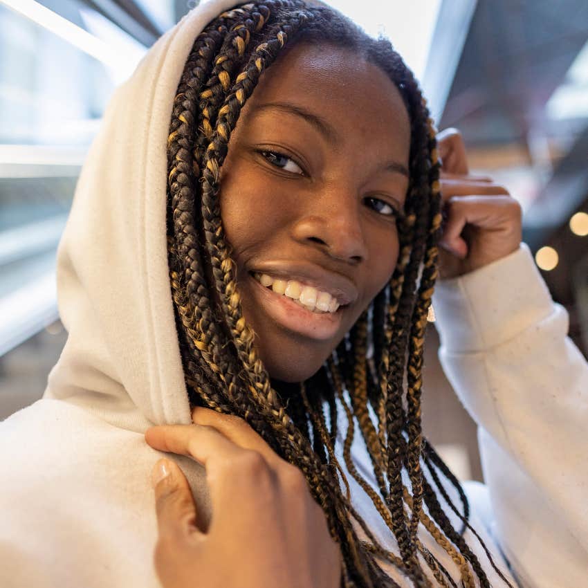 fashionable gen Z woman smiling