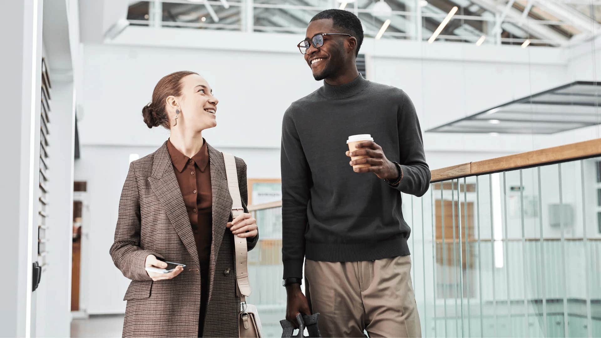 co-workers grabbing coffee together at work