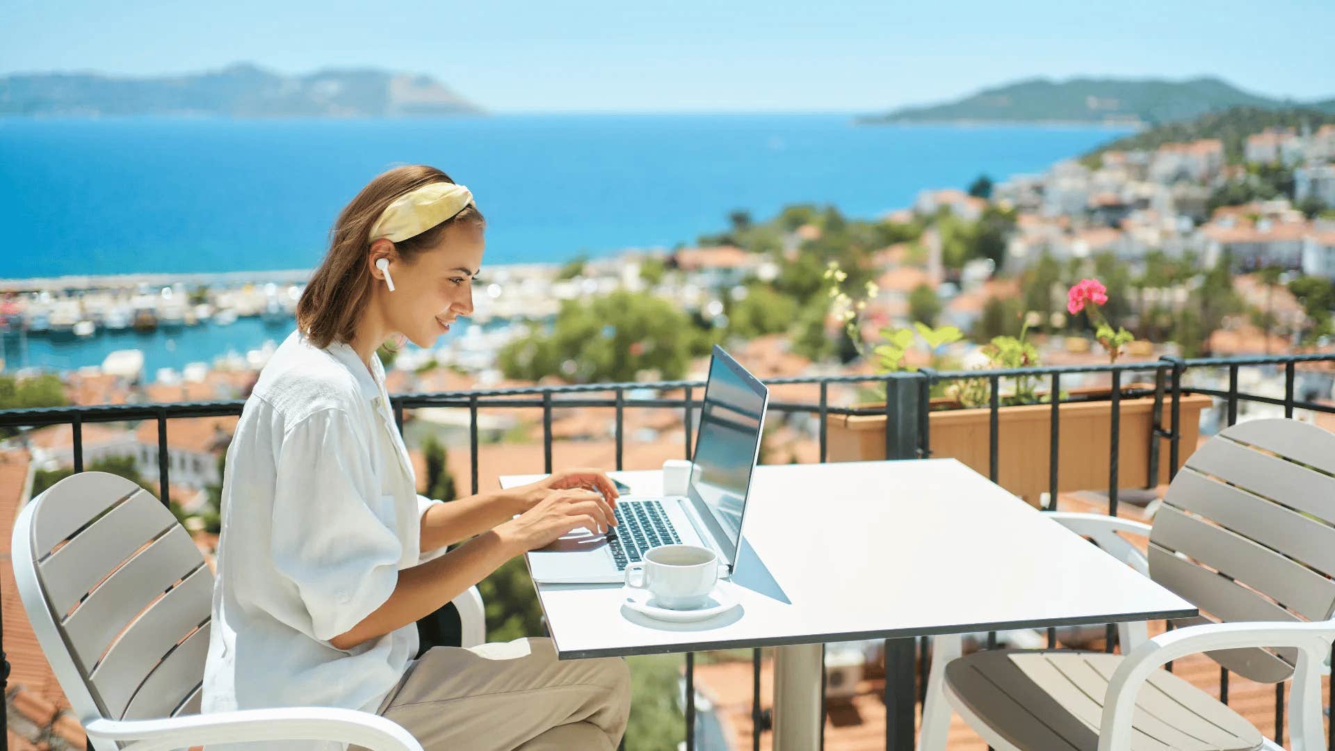 woman vacationing while she works on her laptop