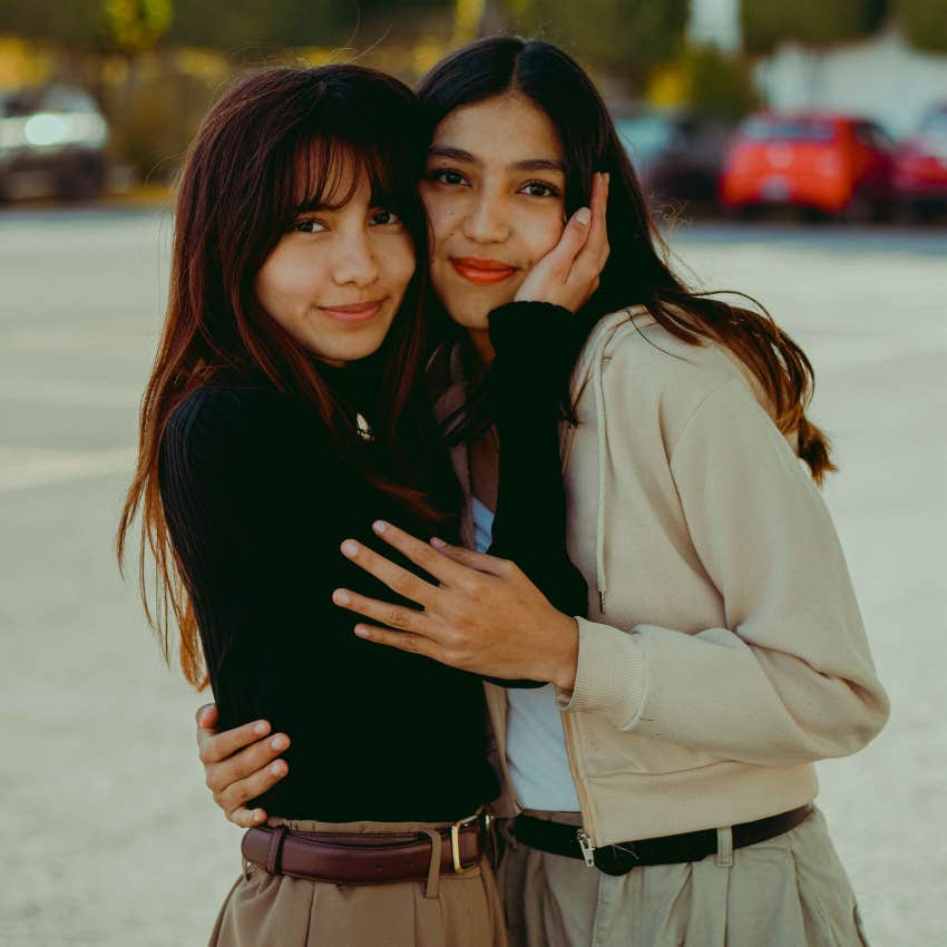 friends with a deep connection smiling and hugging