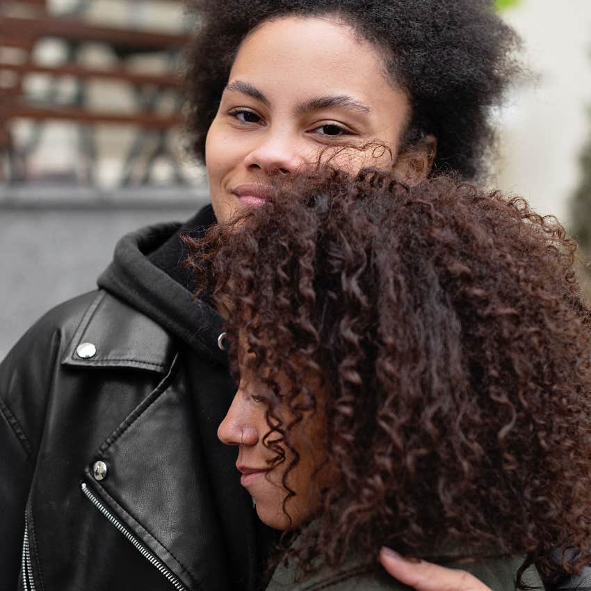 woman who grew up sharing a room with a sibling showing empathy to friend