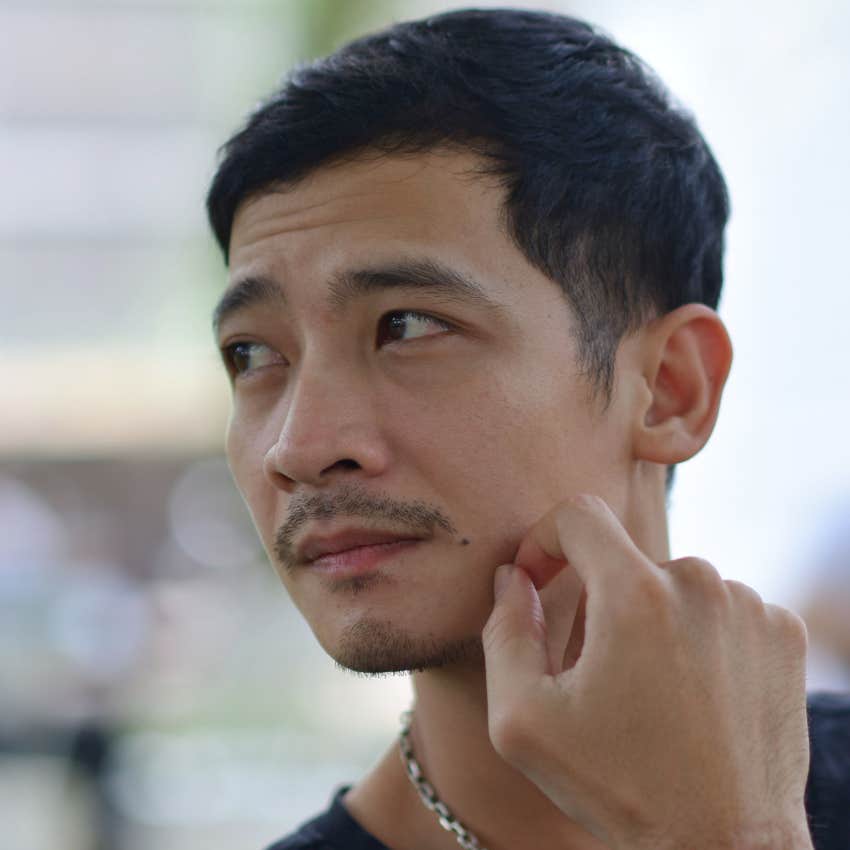 confident man thinking deeply about worst-case scenarios