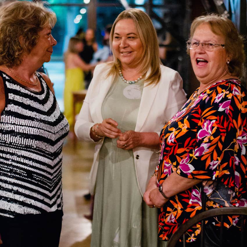 fake person pretending to be nice to women at an event
