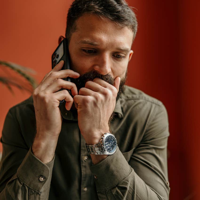 man whose life seems to flow naturally practicing the law of detachment while talking on the phone