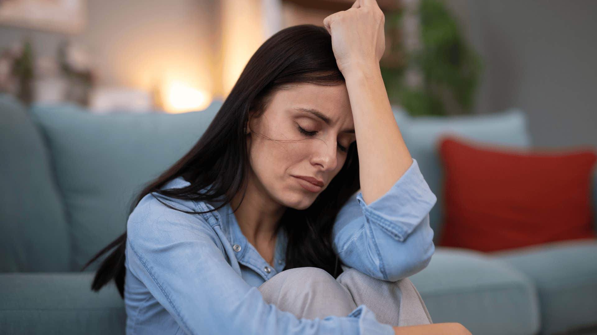 woman in blue shirt upset at the people who constantly let them down