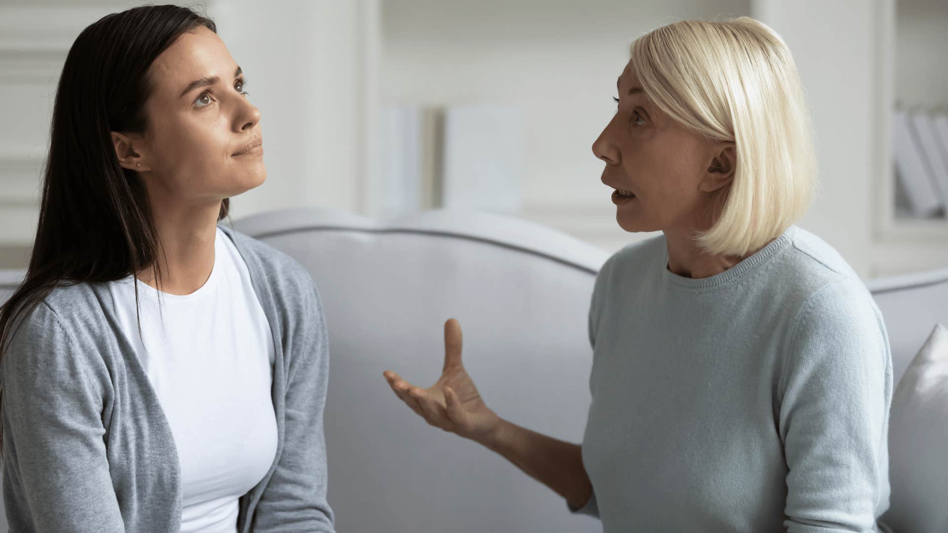 woman rolling her eyes at mom as they're ungrateful