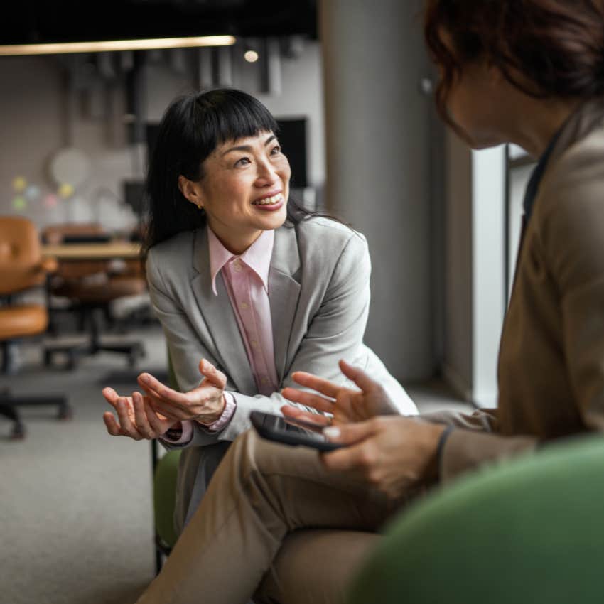 professional woman trying to impress everyone at work