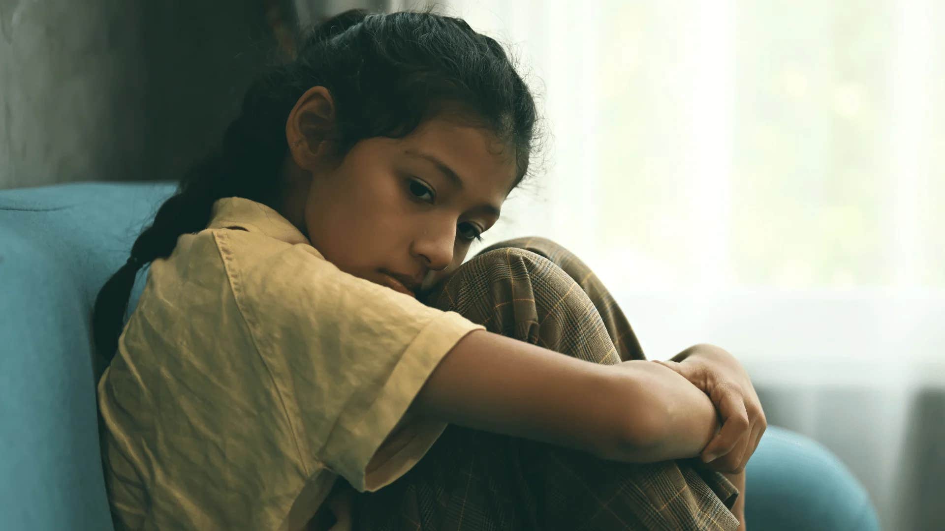 young girl feeling invisible and isolated