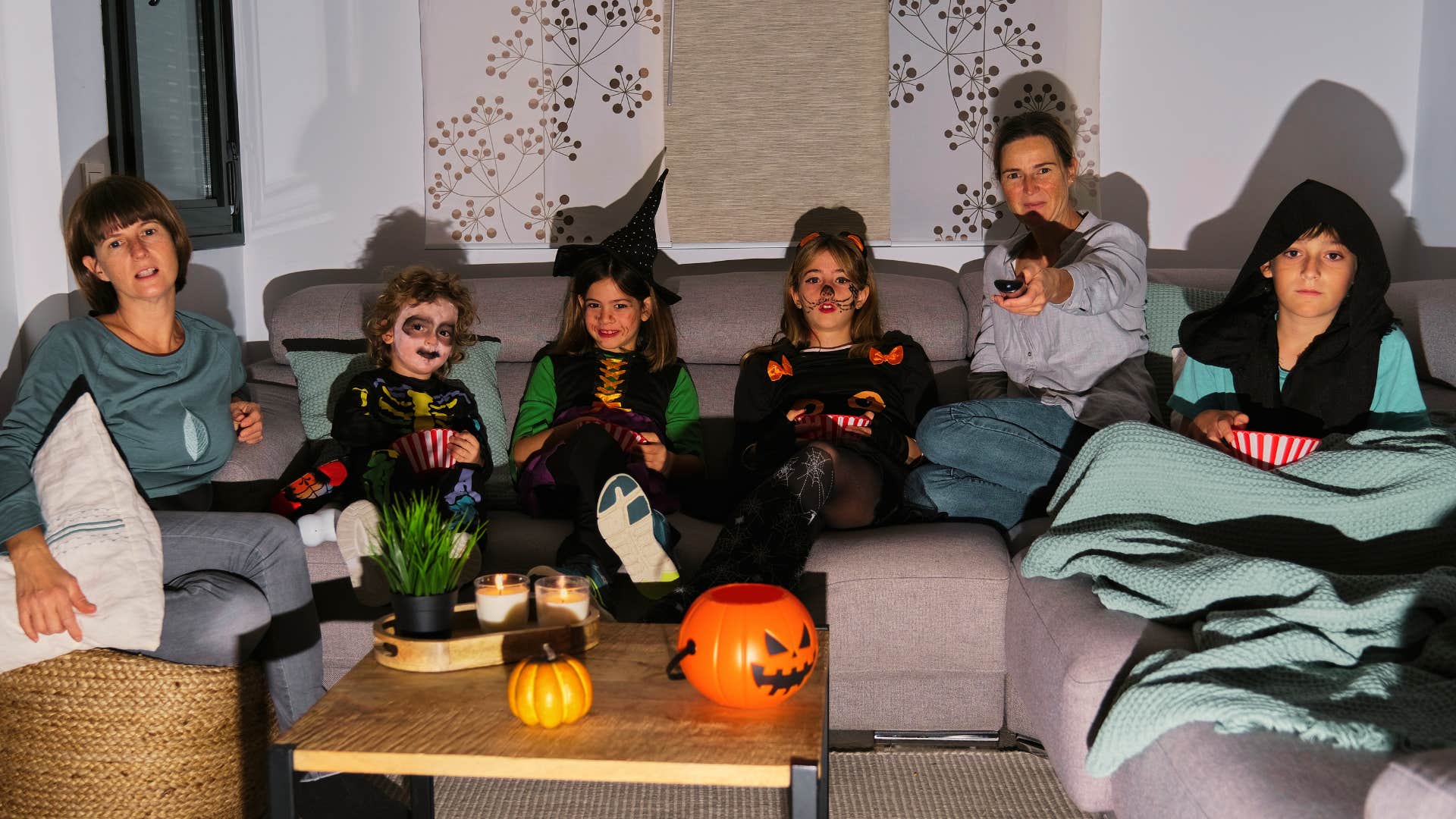 kids watching spooky marathons on Halloween