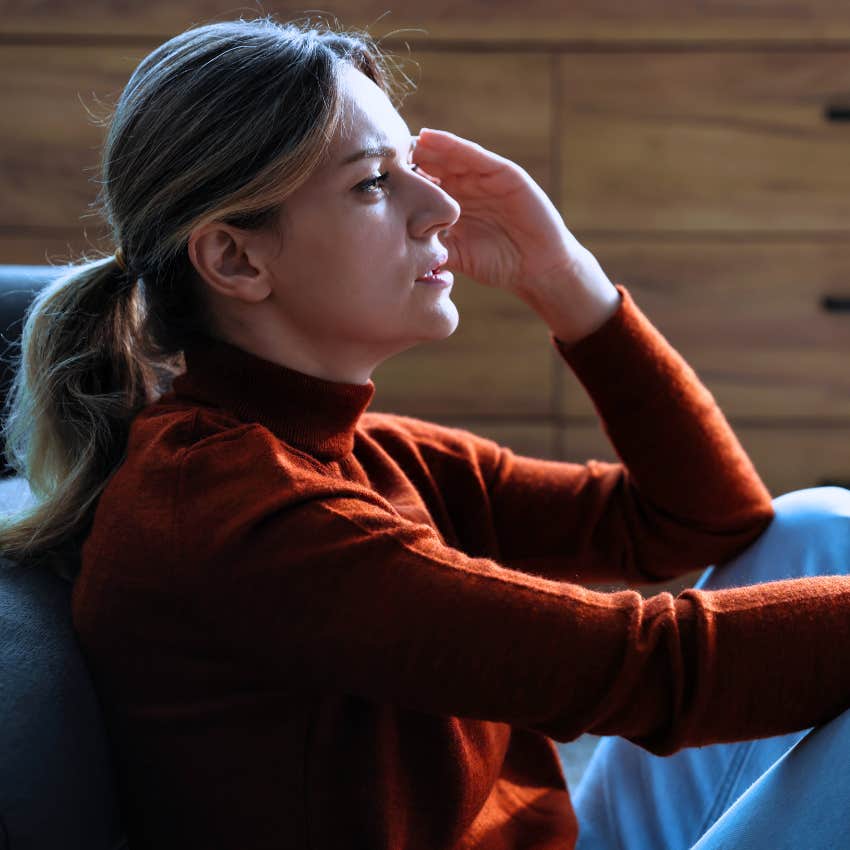 Woman who struggles with self-esteem at home.