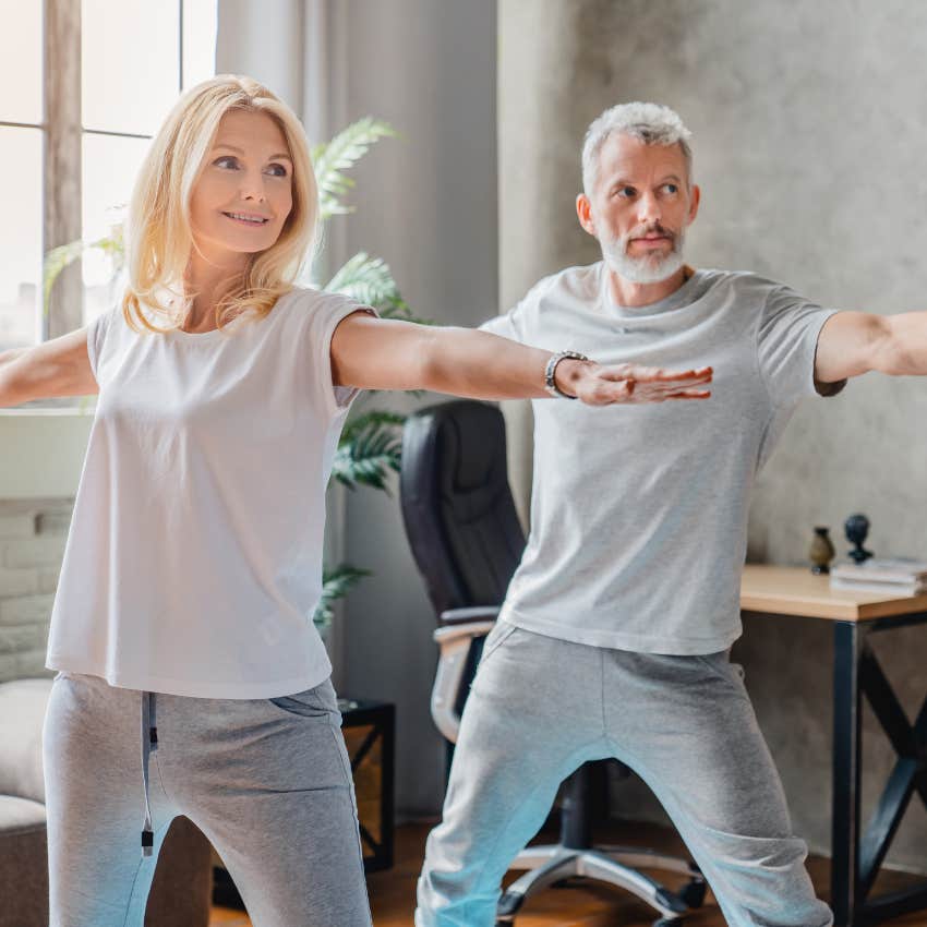 empty nest parents enjoying time to themselves doing yoga