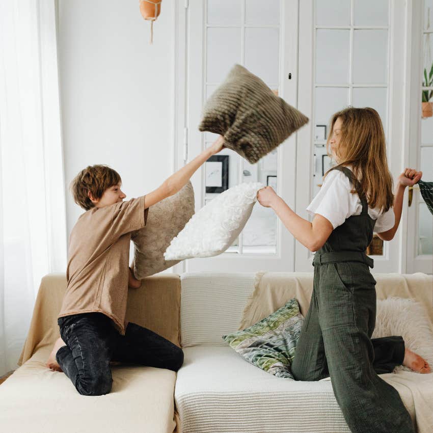 youngest sibling playing with mom