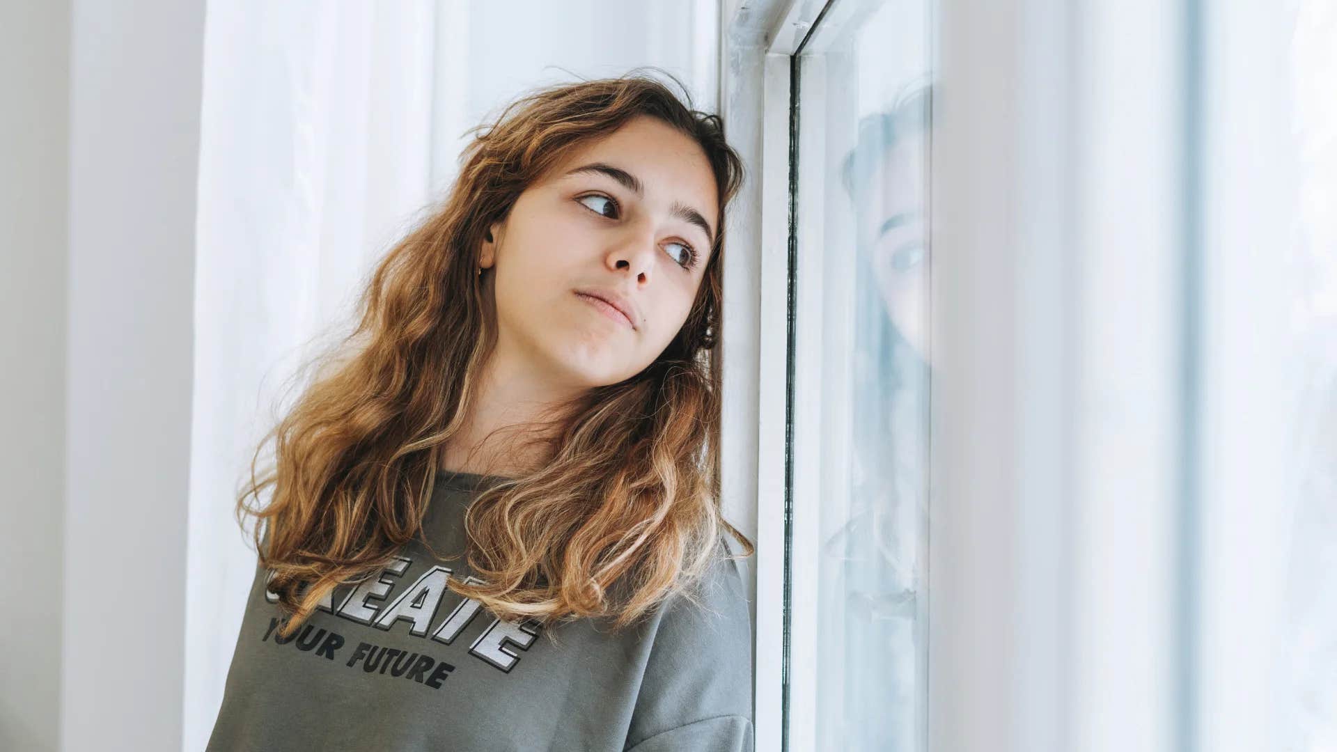 woman settling in her relationship thinking to herself it's fine