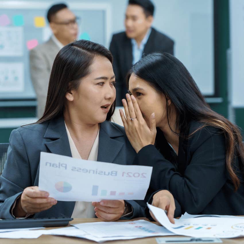 person being low-key pushed out of their job noticing gossiping coworkers
