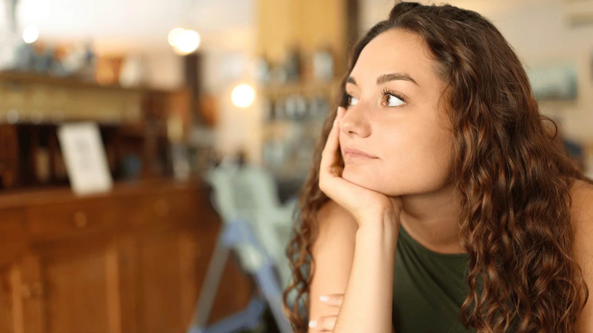 young woman in a deeply reflective hermit phase having an appetite for spiritual topics is insatiable