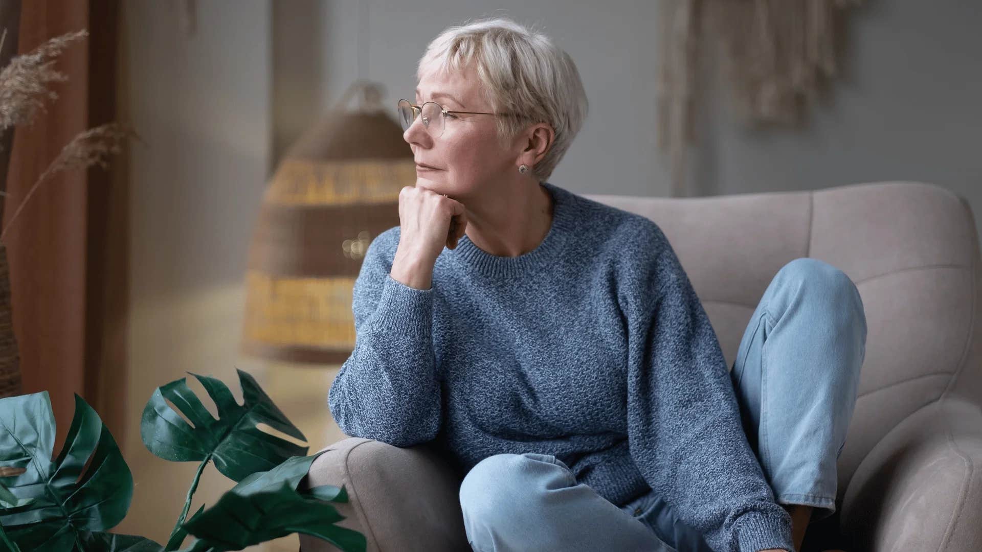 woman in a deeply reflective hermit phase losing interest in things that used to excite them