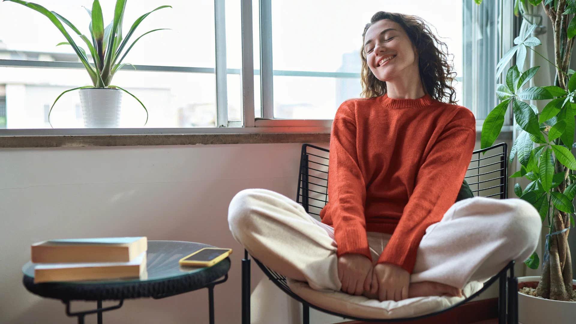 young woman in a deeply reflective hermit phase spending more time alone