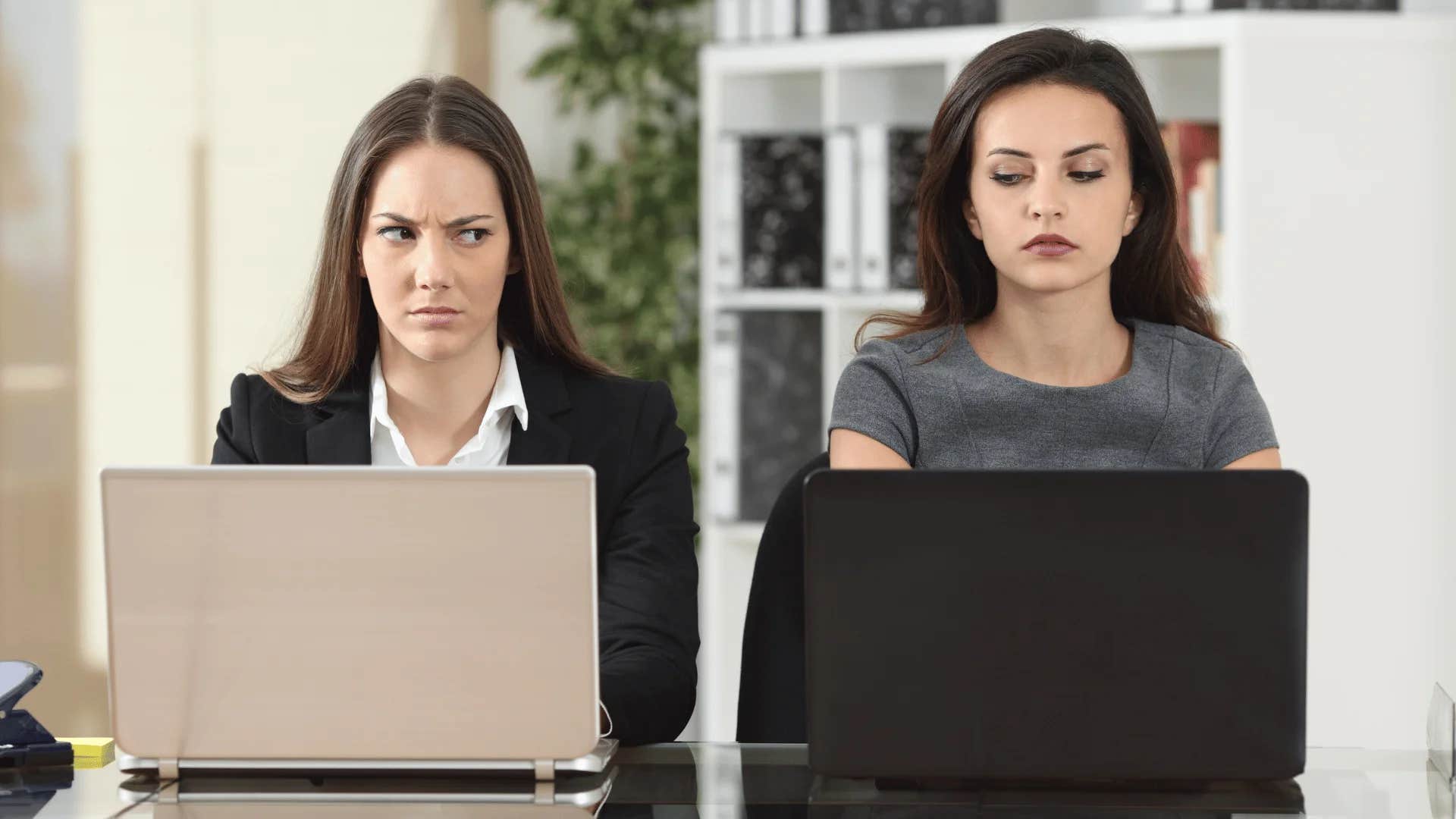 woman who doesn't respect colleague taking credit for her achievements