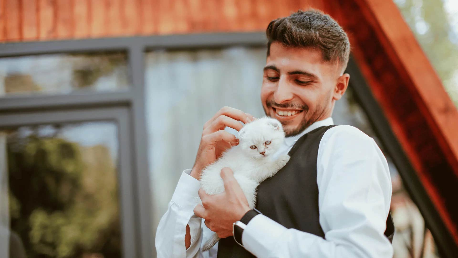 genuinely good-hearted man being nice to all living creatures
