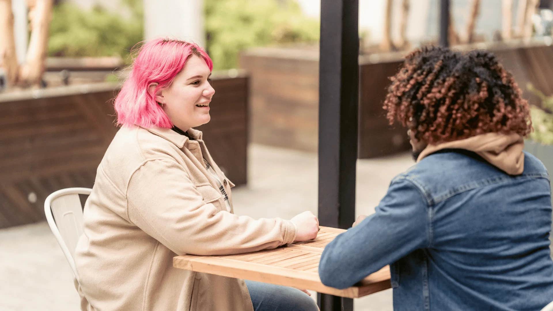 genuinely good-hearted woman paying attention to the person around her