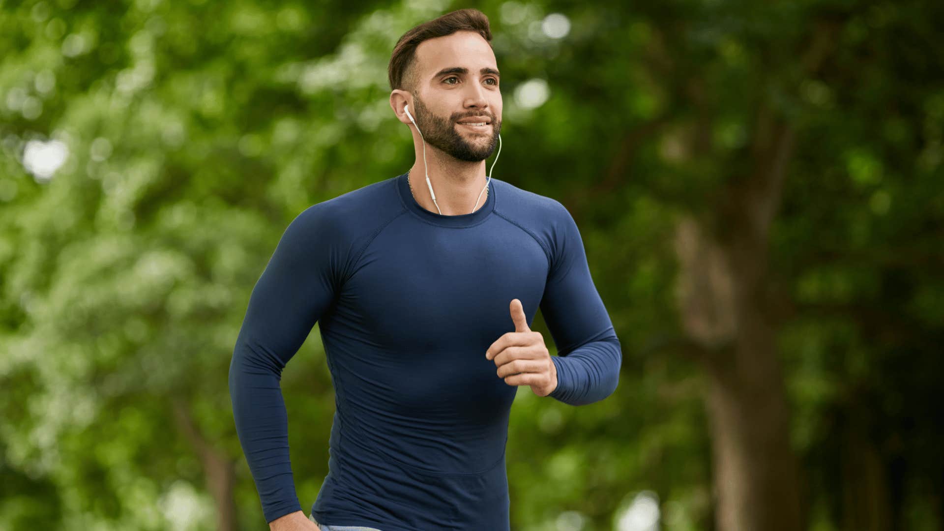 man in blue shirt doing a thirty minute workout five times a week as he runs