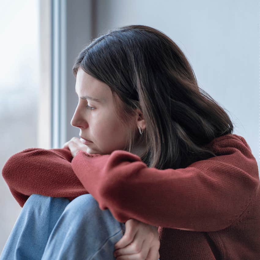 woman hiding deep depression behind narcissistic behavior being uncharacteristically quiet