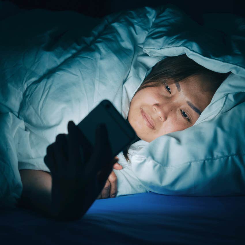 woman obsessed with her phone lacking bodily awareness