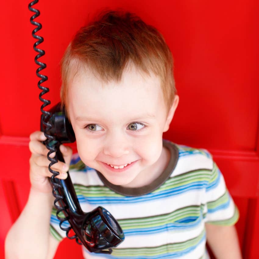 kid calling someone on the phone