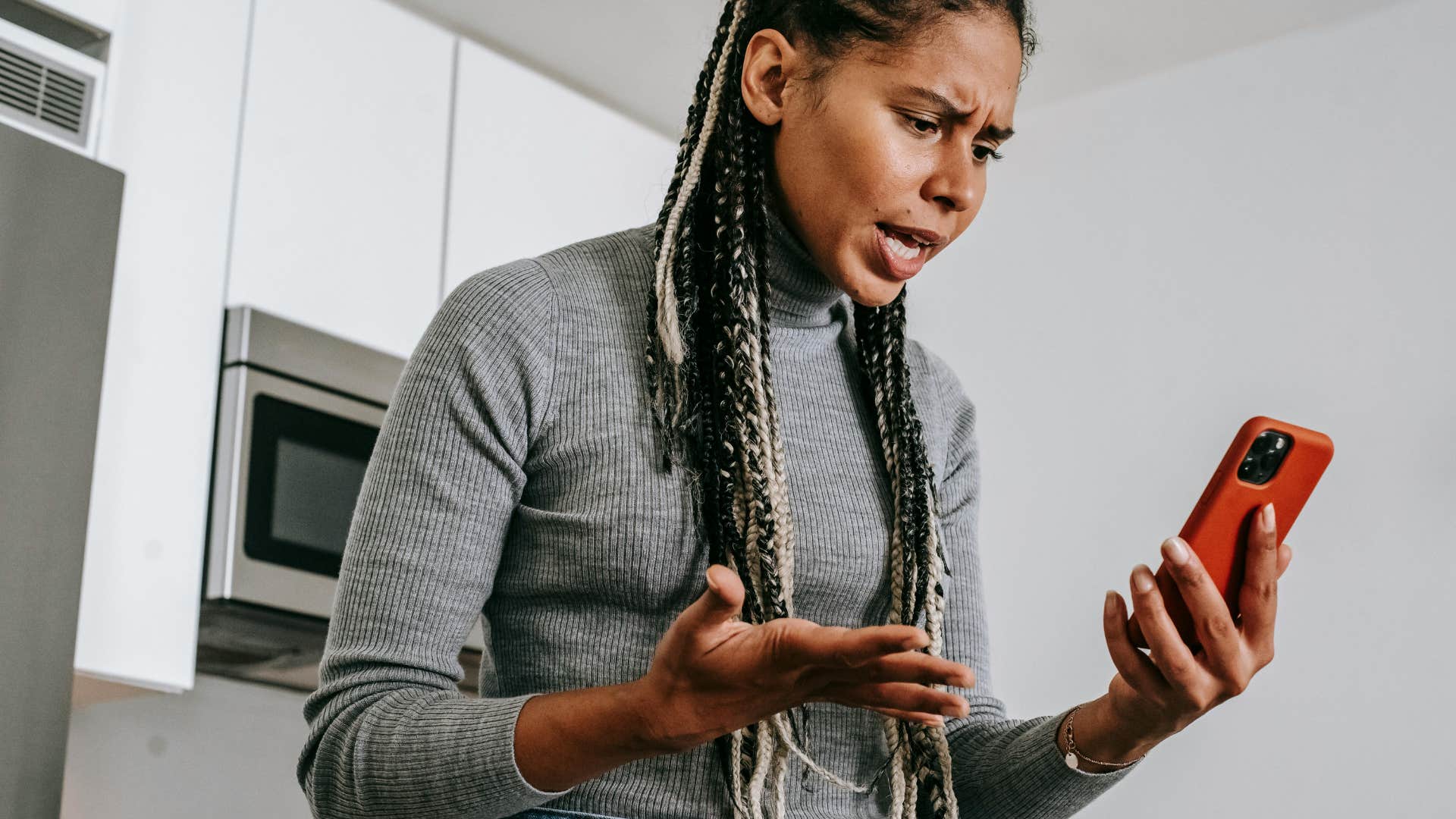 woman telling someone she'll call them later