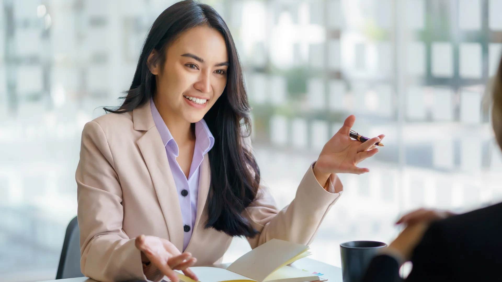 young woman raised right telling colleague thanks for your time