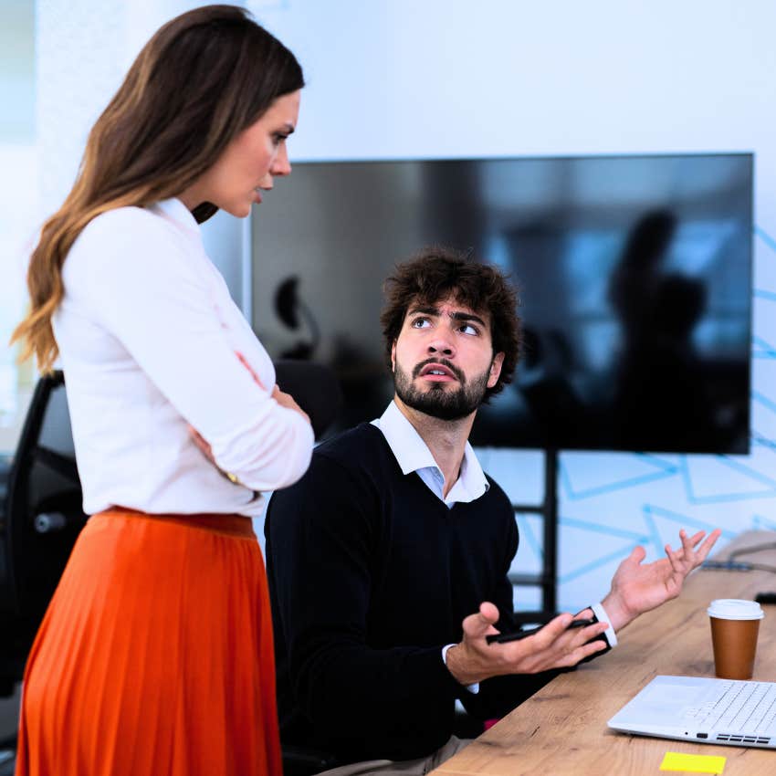 woman faking her intelligence telling colleague I don't need to know that