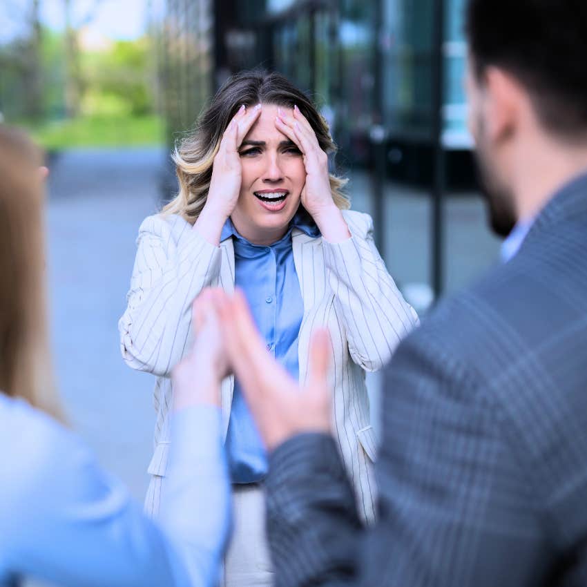 angry woman saying I'm obviously right to co-workers questioning her
