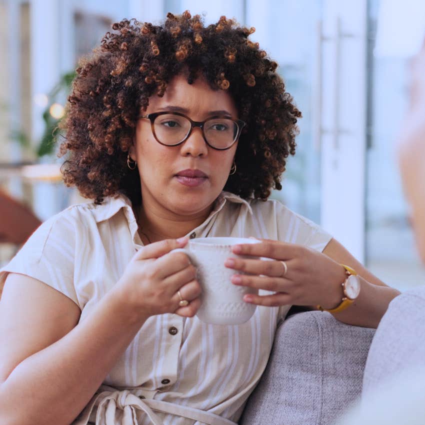 complicated woman saying tell me more about that to her friend in conversation