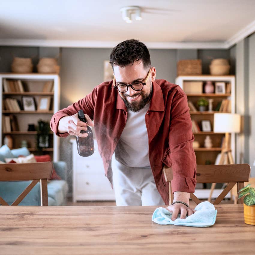 energetic man cleaning his house because he can't sit still