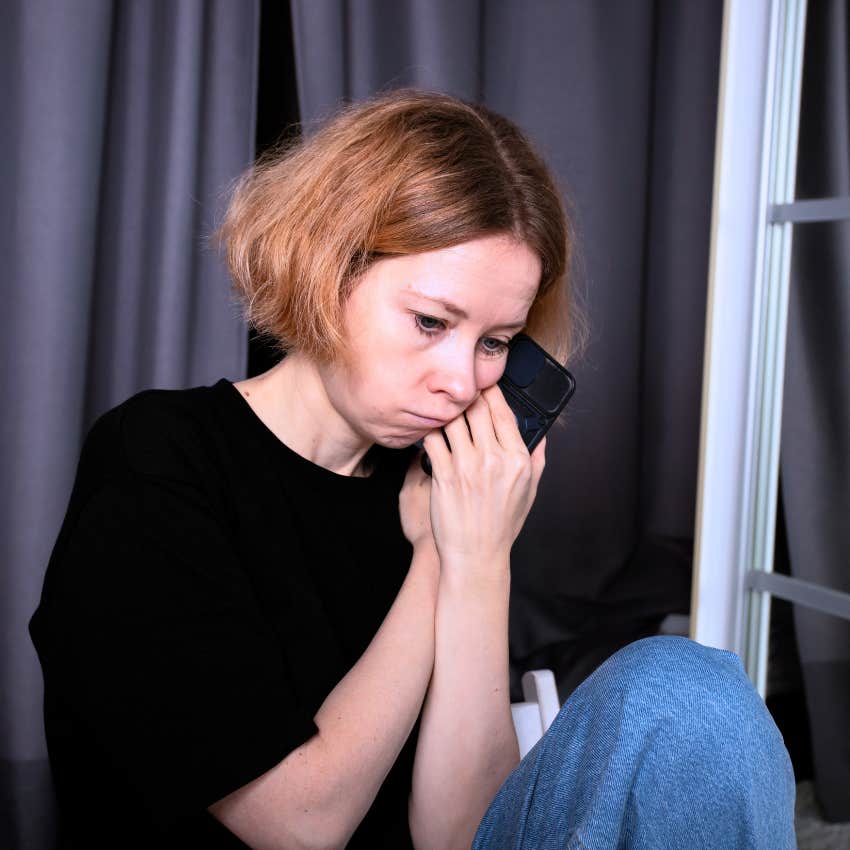 Woman suppressing and avoiding emotions at home.