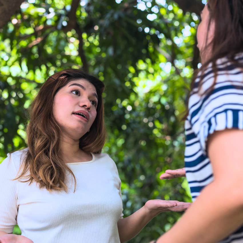 irritated woman saying what if I to her friend changing plans