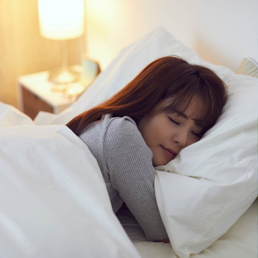 woman who values her personal space laying in bed alone