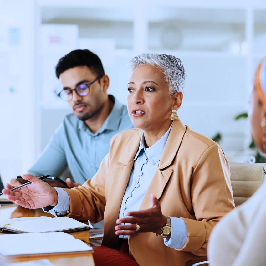 intelligent intimidating woman not trying to be liked in work meeting
